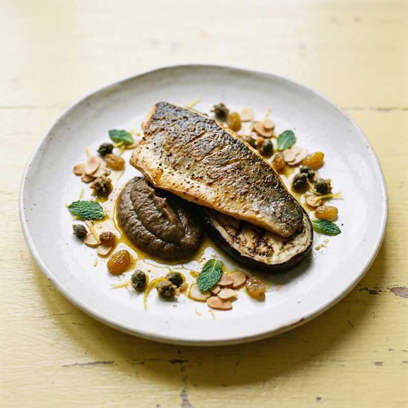 Moroccan Spiced Sea Bream with Smoked Aubergine and Golden Raisins, plated